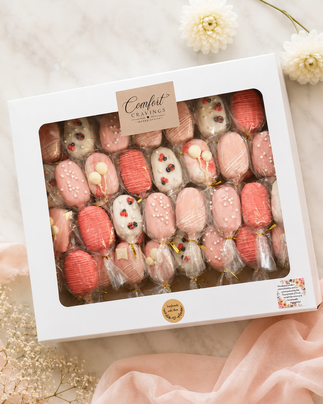 Ladybug and drizzle cakesicle gift box from Comfort Cravings